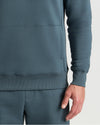 Neptune Half Zip Fleece Sweatshirt with kangaroo pocket and ribbed hem.