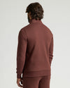 Man wearing Carob Half Zip Fleece Sweatshirt & Jogger 2-Pack, rear view.