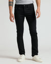 The Refined Ripstop Look: black jeans and white sneakers.