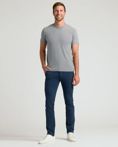 True ClassicMan wearing Slim Comfort Knit Chino Pant, smiling in casual attire.