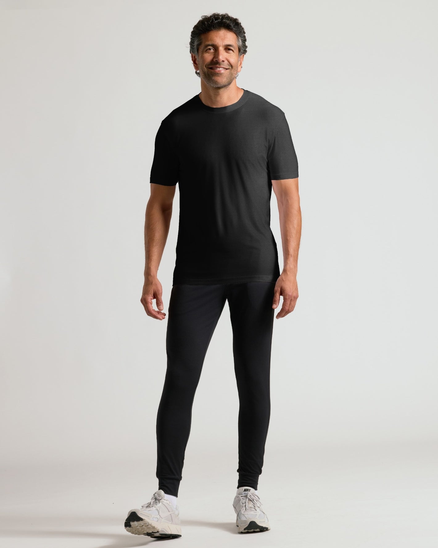 Black Active Crew and Jogger 2-Pack worn by a smiling man.