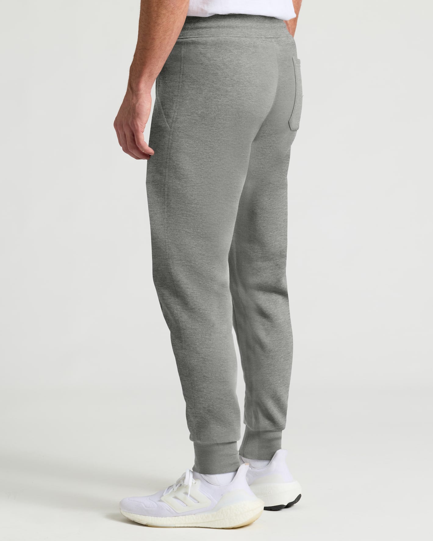 Medium Heather Gray Joggers with White Sneakers.