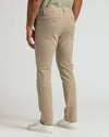 Khaki Slim Chino Pants 2.0 with white sneakers and green shirt.