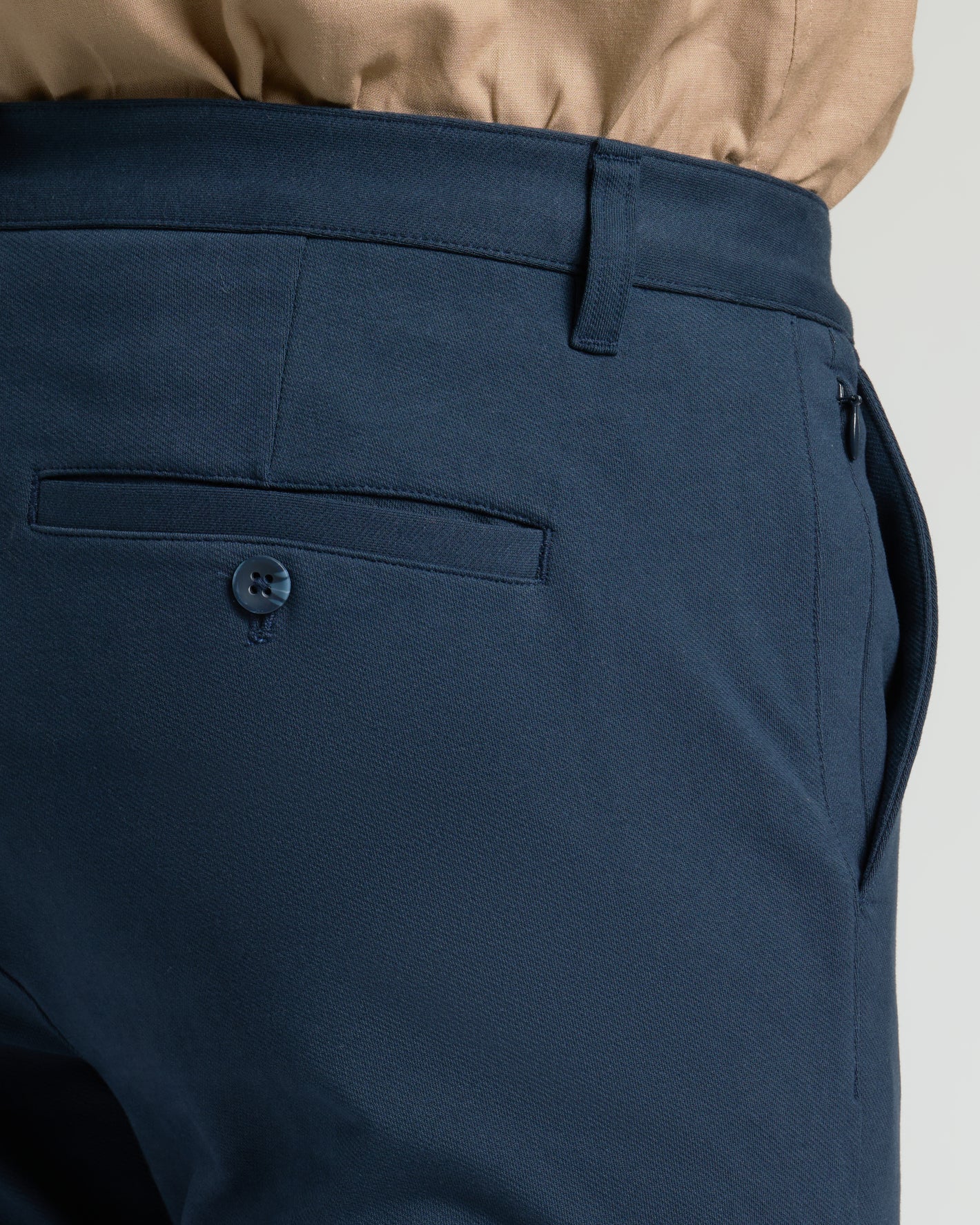 Navy Slim Chino Pants 2.0 showcasing welted pocket detail.