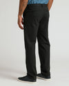 Black Straight Chino Pants 2.0 with back welt pockets and sleek sneakers.