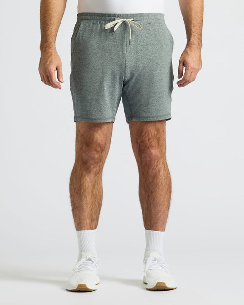 Heather Gray Active Comfort Shorts on a man with white socks and sneakers.