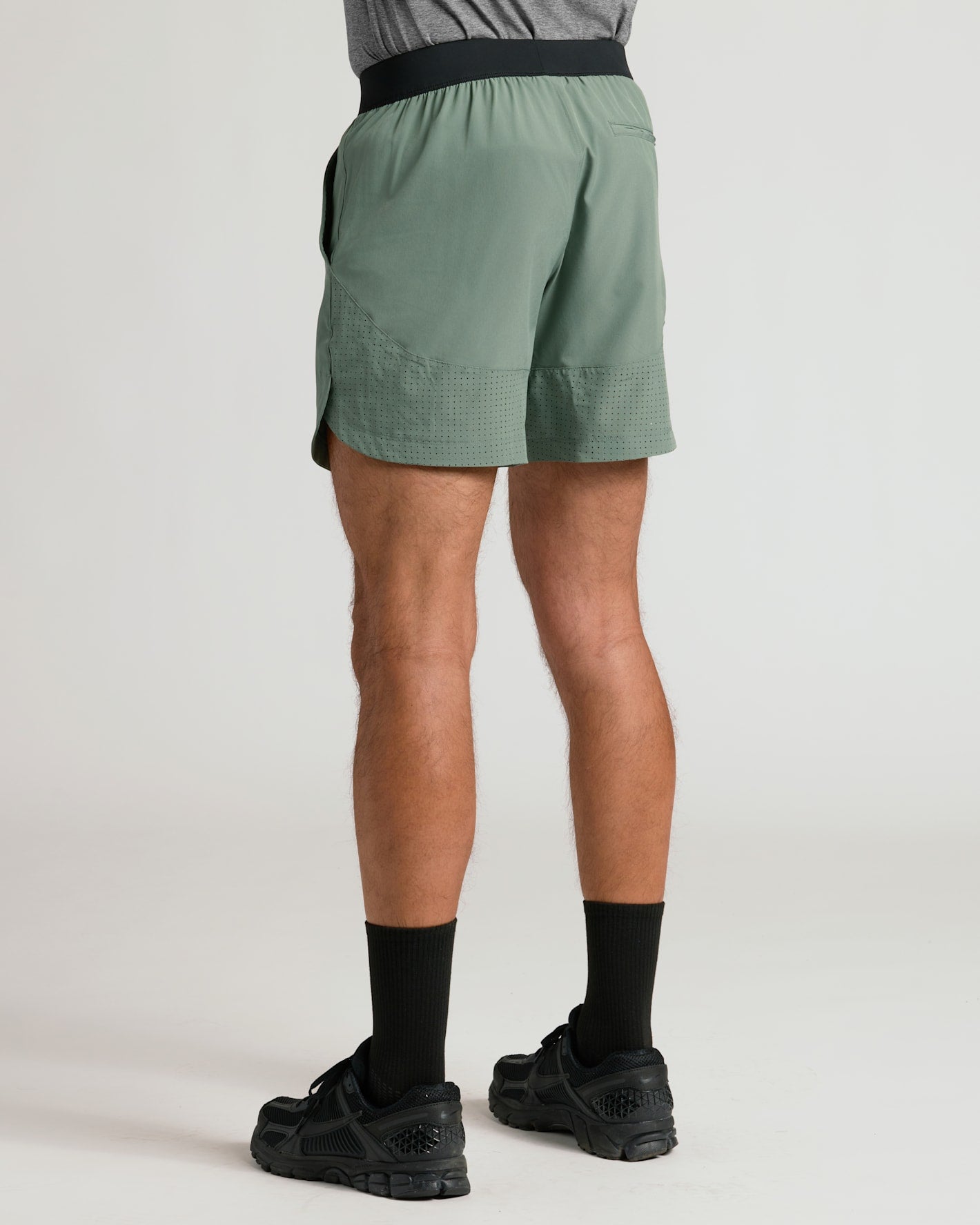 7 Juniper Active Training Shorts 2.0 with black socks and shoes.