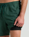 7 Marine Spruce Seersucker Swim Trunks with black compression liner visible.