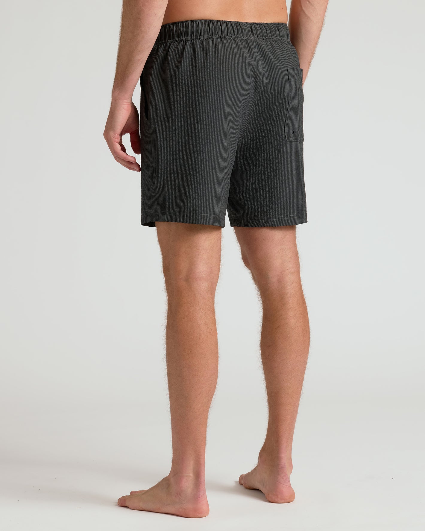 Back view of 7 Smoke Seersucker Swim Trunks with pocket.
