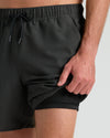 7 Smoke Seersucker Swim Trunks with inner compression liner exposed.