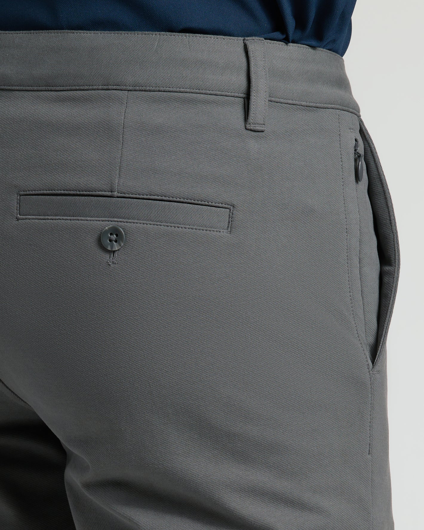 9 Carbon Chino Shorts 2.0, showcasing waistband, pockets, and belt loop.