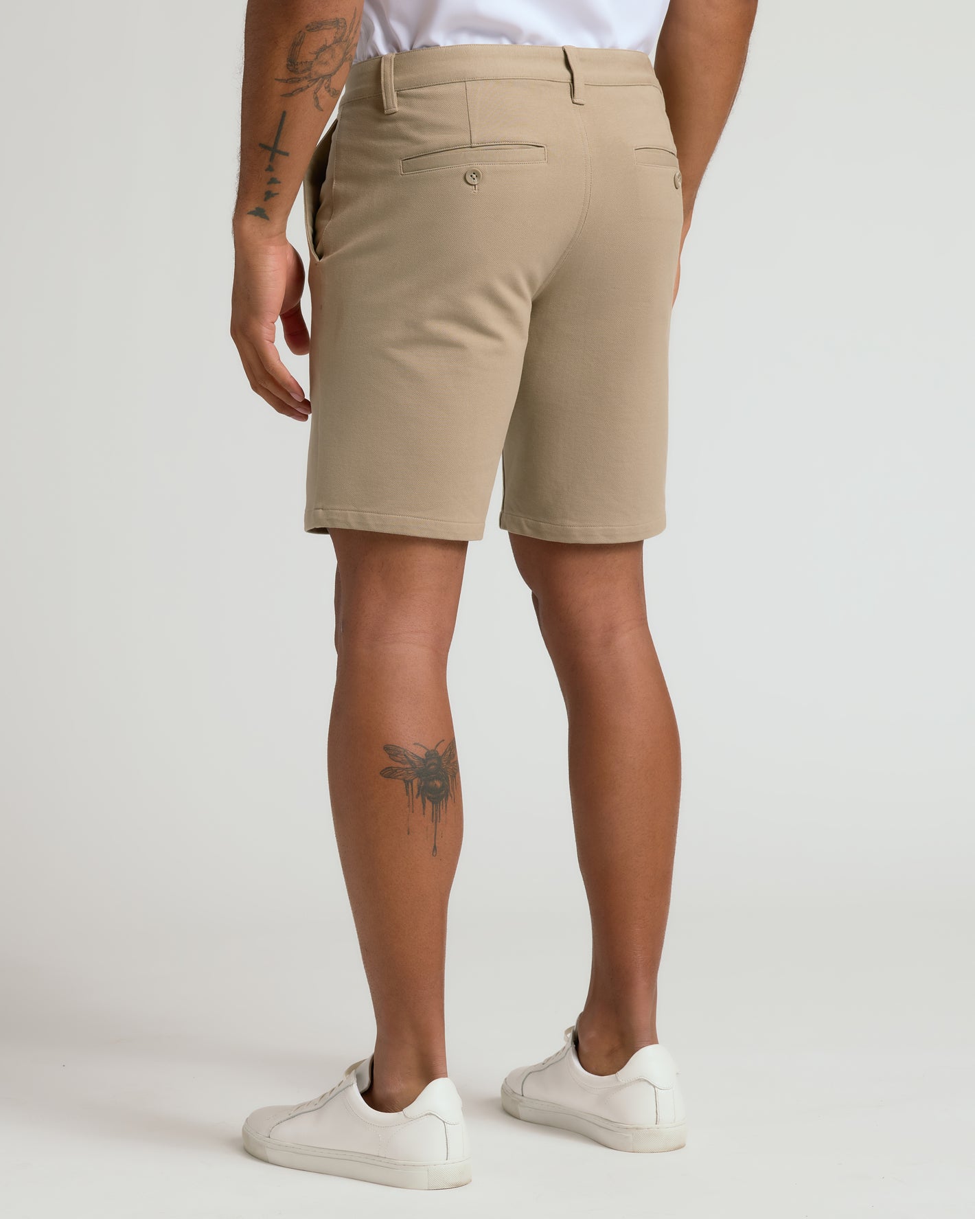 Back view of 9 Khaki Chino Shorts 2.0 worn with sneakers.