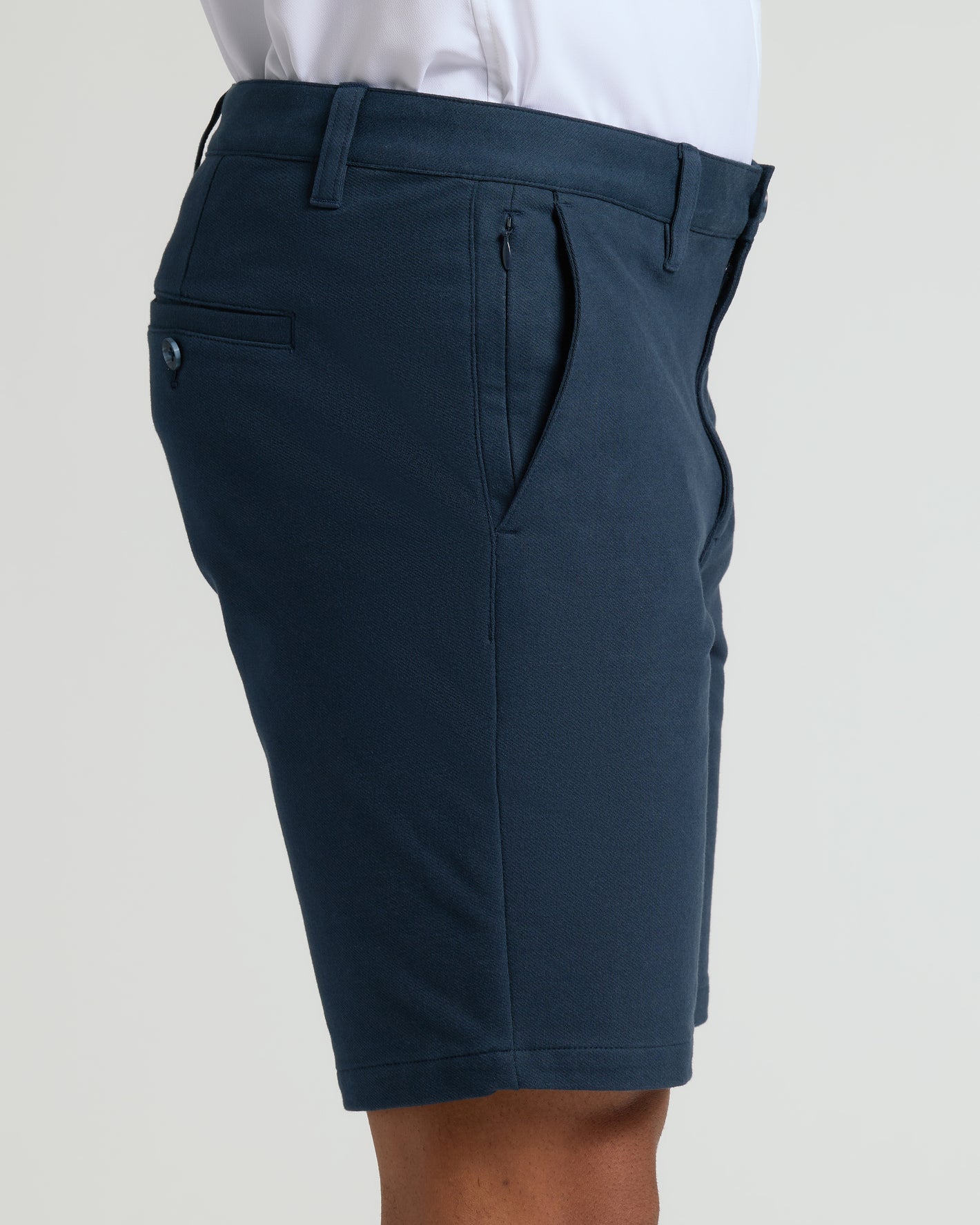 9 Navy Classic Chino Shorts 2.0 worn with a tucked-in shirt.