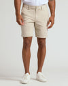 9 Sandstone Chino Shorts 2.0 on model with white sneakers.