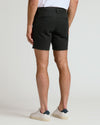 7 Black Chino Shorts 2.0, tailored, button-flap pockets, worn with sneakers.