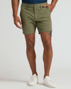 7 Military Green Classic Chino Shorts, tailored fit, with white sneakers.