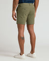 7 Military Green Classic Chino Shorts with welt pockets and white sneakers.