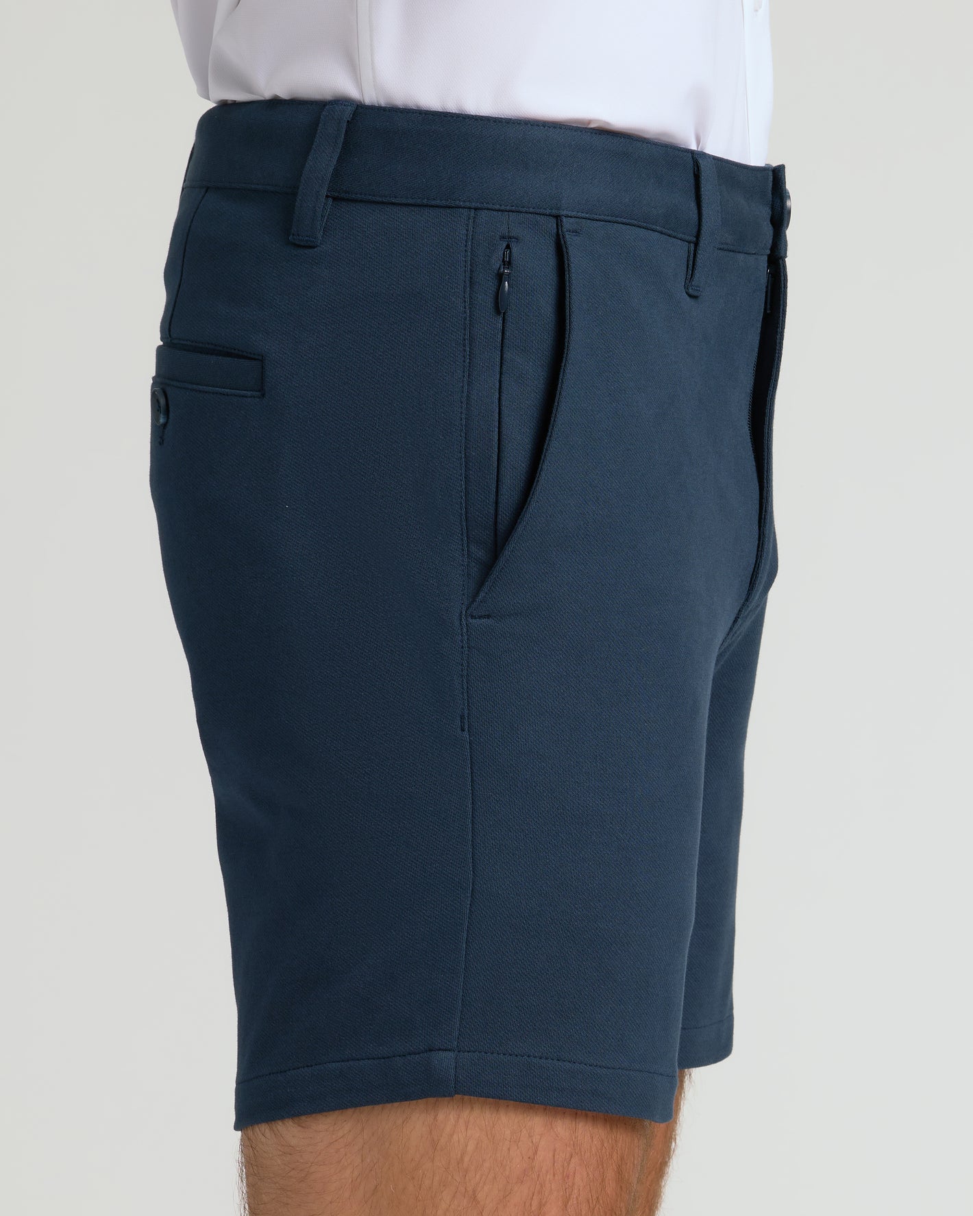 7 Navy Chino Shorts 2.0 with zippered pocket and tailored fit.