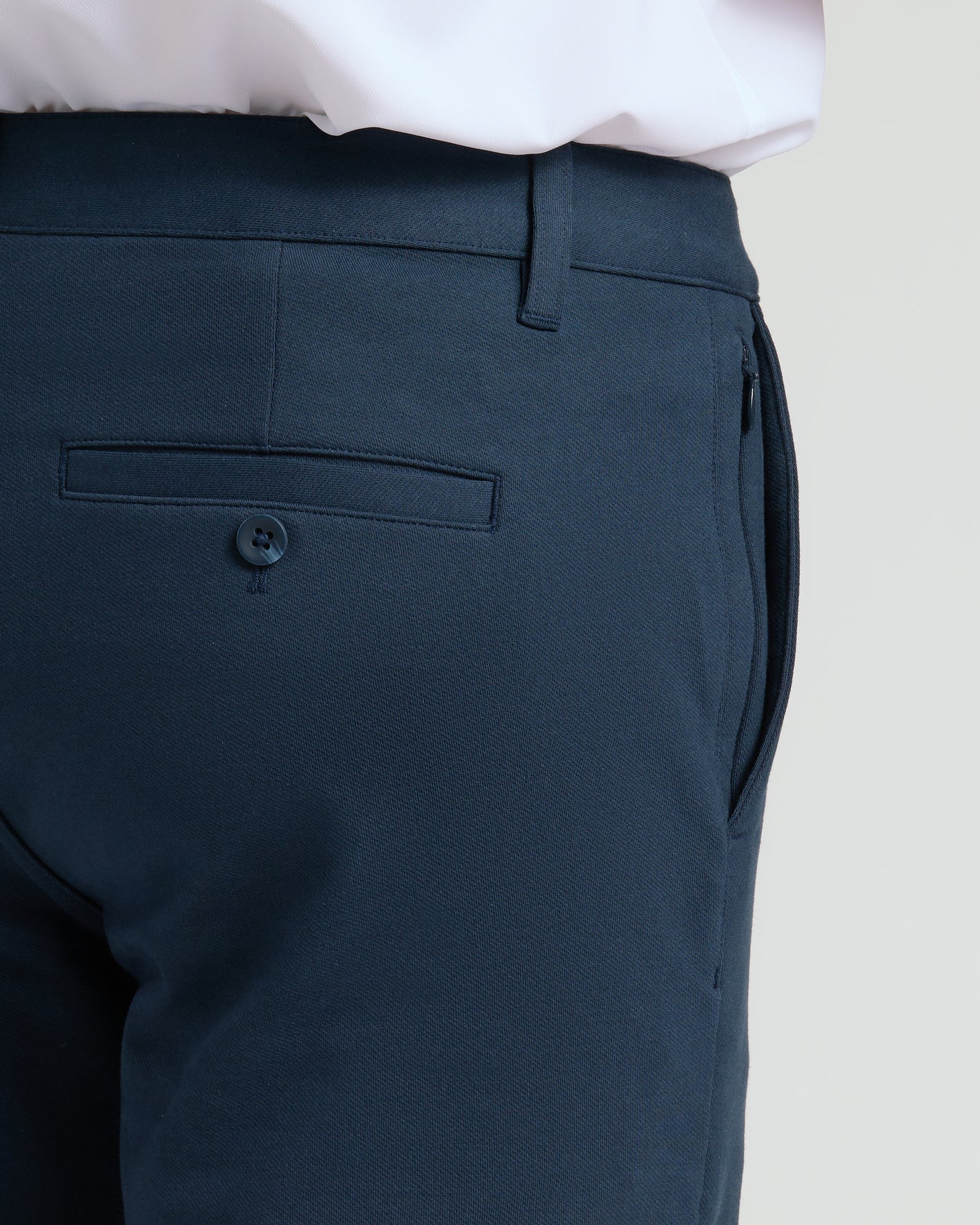 7 Navy Chino Shorts 2.0, featuring buttoned welt pocket and side seam pocket.