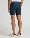 7 Navy Chino Shorts 2.0, fitted, mid-thigh, with buttoned back pockets.