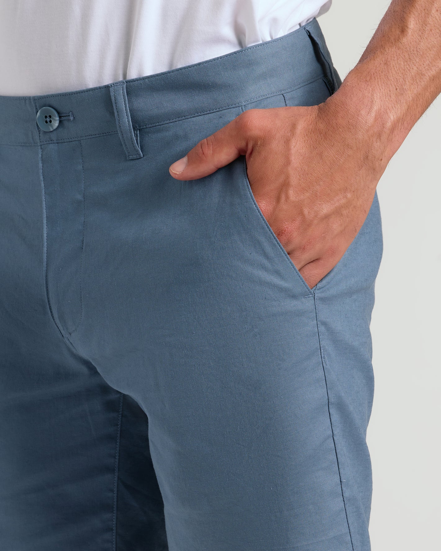 Person wearing 9 Fiord Linen Shorts with hand in pocket.