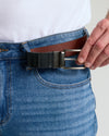Casual Reversible Stretch Belt being threaded through denim belt loops.