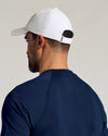 Back view of a person wearing the White Active Running Cap.