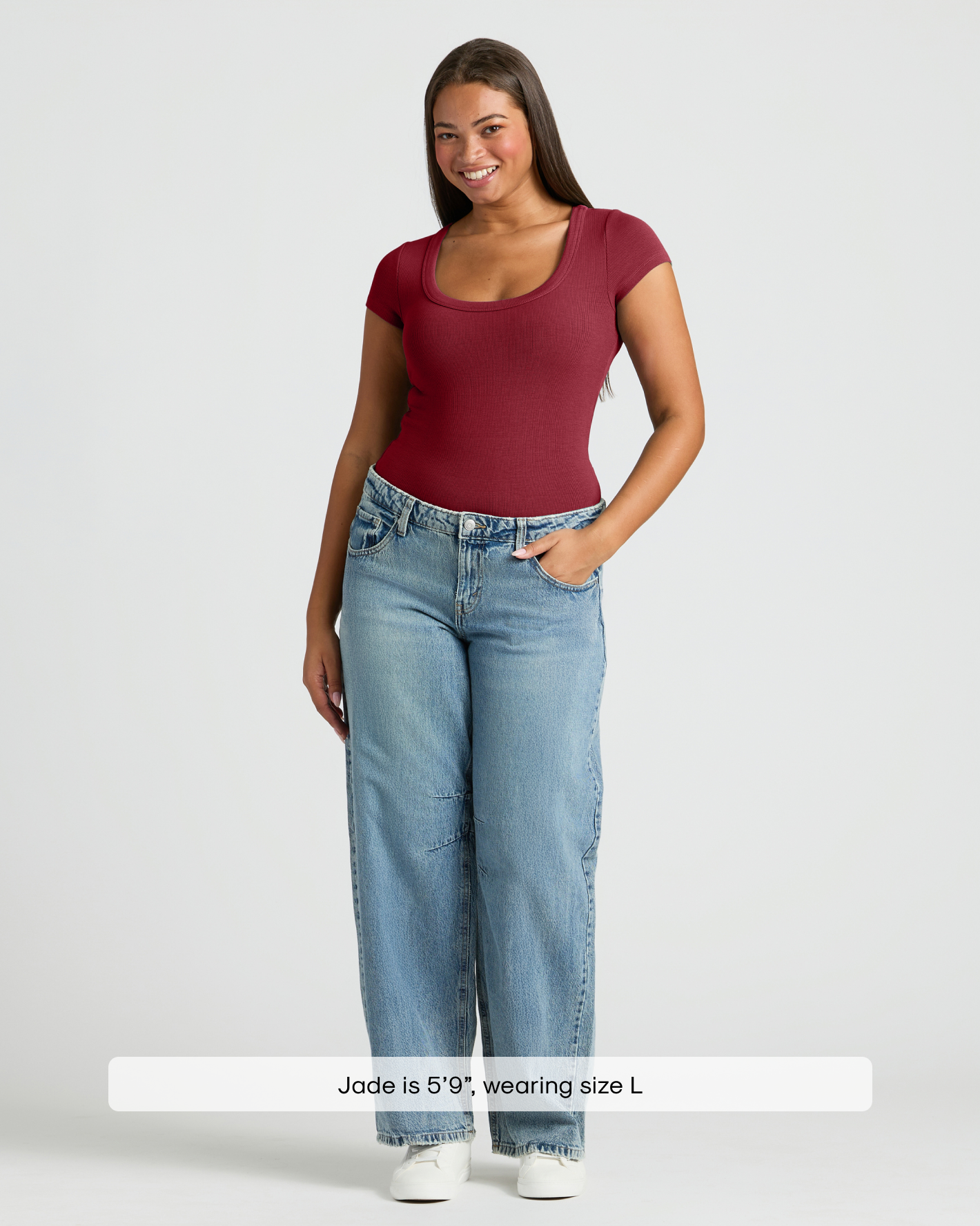 Woman in Womens Dark Maroon Ribbed U-Neck Tee with jeans.