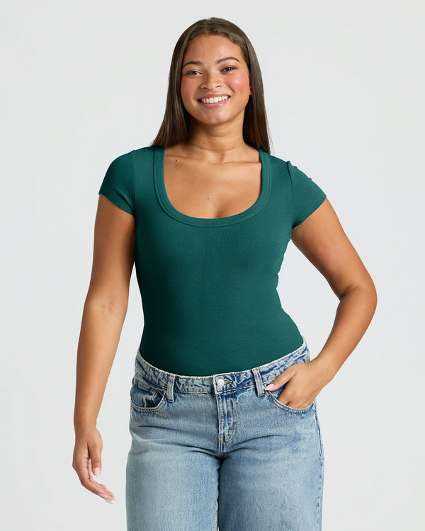 Womens Deep Emerald Ribbed U-Neck Tee 3-Pack worn by smiling woman. MODEL_INFO: Jade is 5'9", wearing a size L