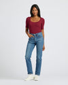Woman modeling Womens Dark Maroon Ribbed 3/4 Sleeve Scoop Neck Tee with jeans.