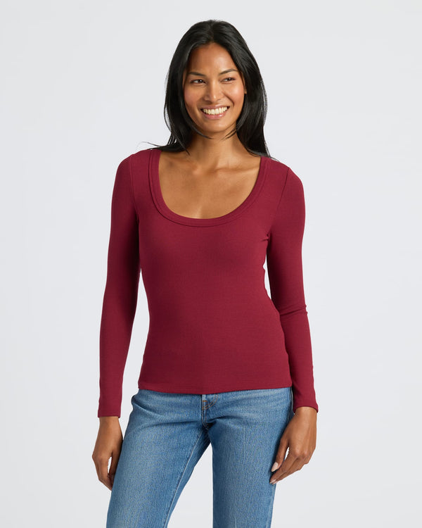 Womens Dark Maroon Ribbed Long Sleeve Scoop Neck Tee modeled confidently. MODEL_INFO: Candy is 5'9", wearing a size S