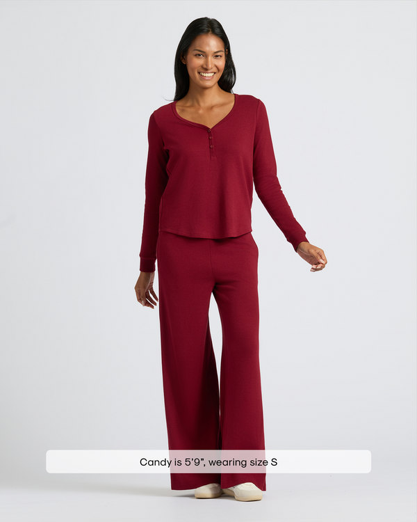 Model wearing Womens Dark Maroon Waffle Wide Leg Pants with henley top.