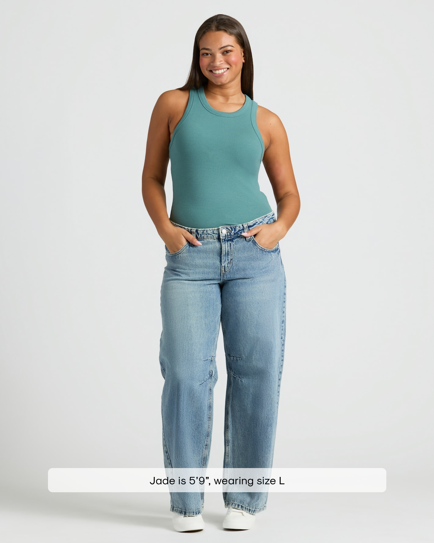 Woman in teal Womens Stormcloud Ribbed High Neck Tank 3-Pack, jeans, sneakers.