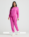 Woman in Womens Electric Fuchsia Slouch Pullover Crew & Relaxed Jogger 2-Pack.