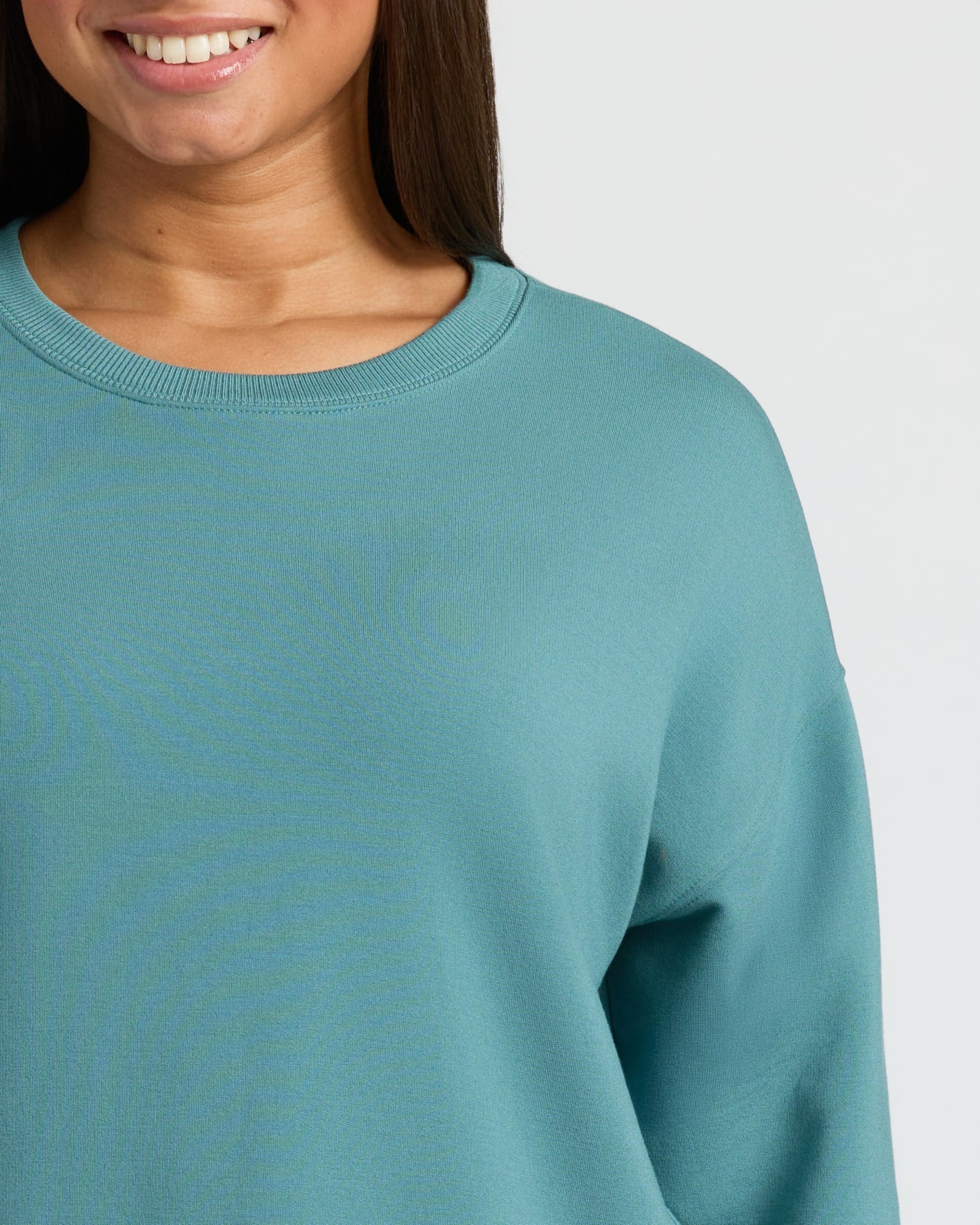 Womens Stormcloud Slouch Pullover Crew on person, showcasing relaxed fit.