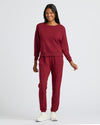 Woman in Womens Dark Maroon Slouch Pullover Crew, casual athleisure style.