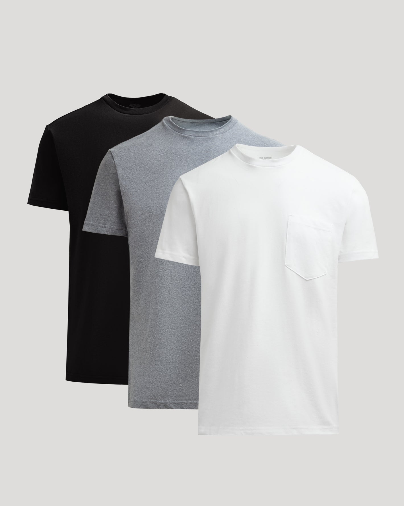 Timeless Heavyweight Pocket Crew 3-Pack: white, gray, black T-shirts.