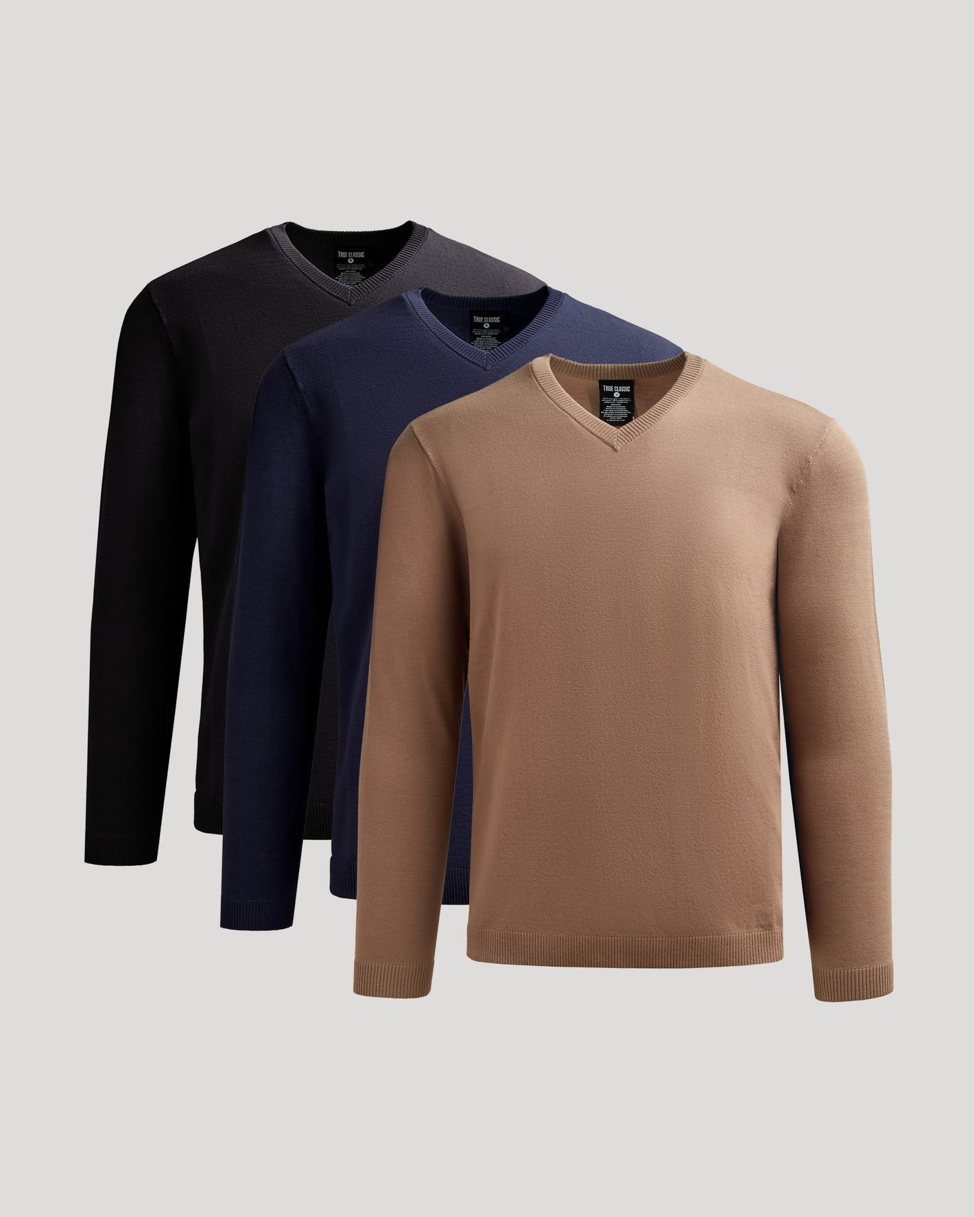 Staple Dressy V-Neck Sweater 3-Pack neatly displayed in camel, navy, black.