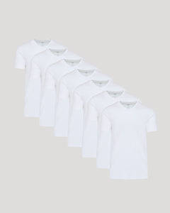True ClassicWhite Premium Pima V-Neck 7-Pack neatly arranged on a gray backdrop.