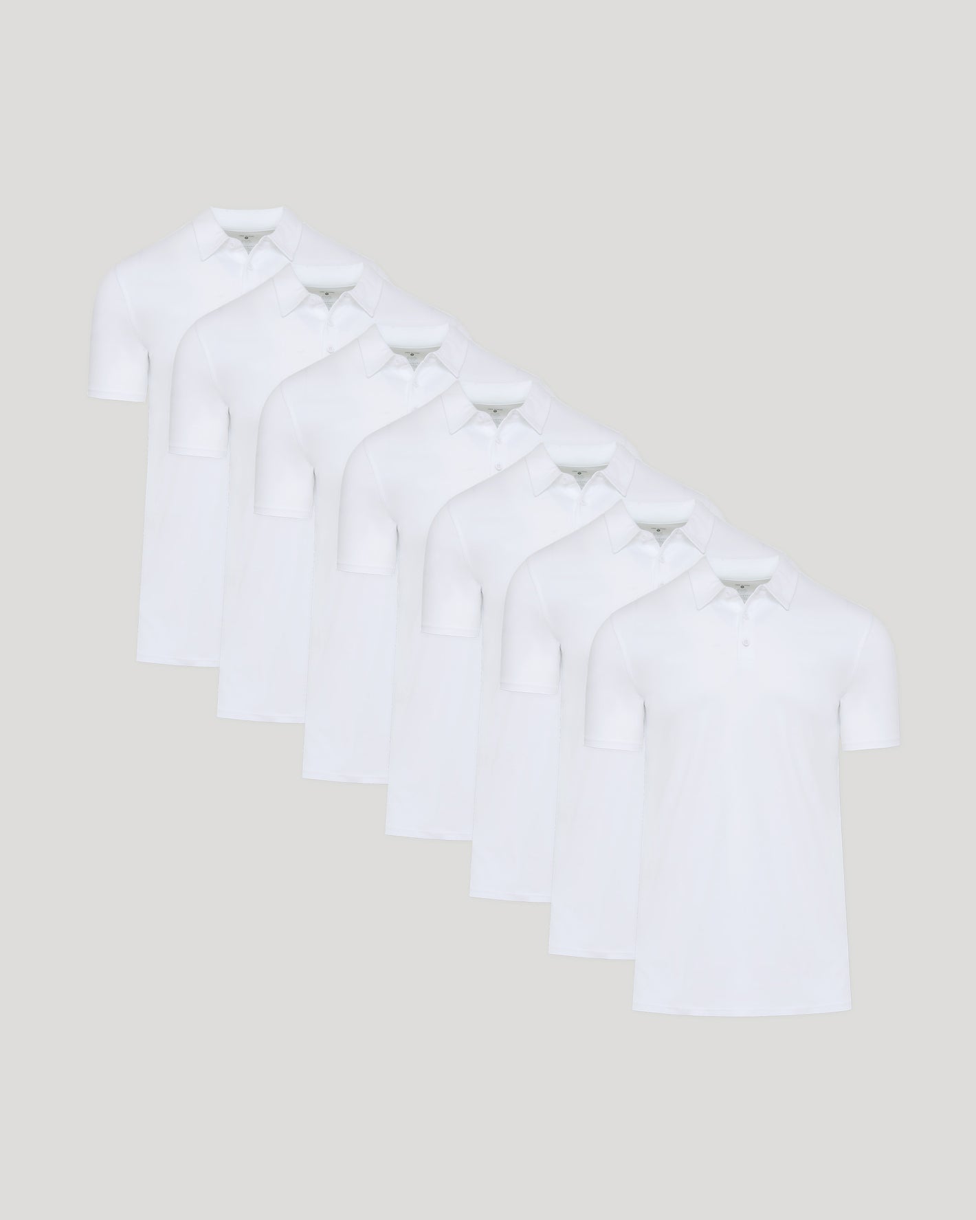 White Tall Premium Pima Polo 7-Pack arranged on light gray background.