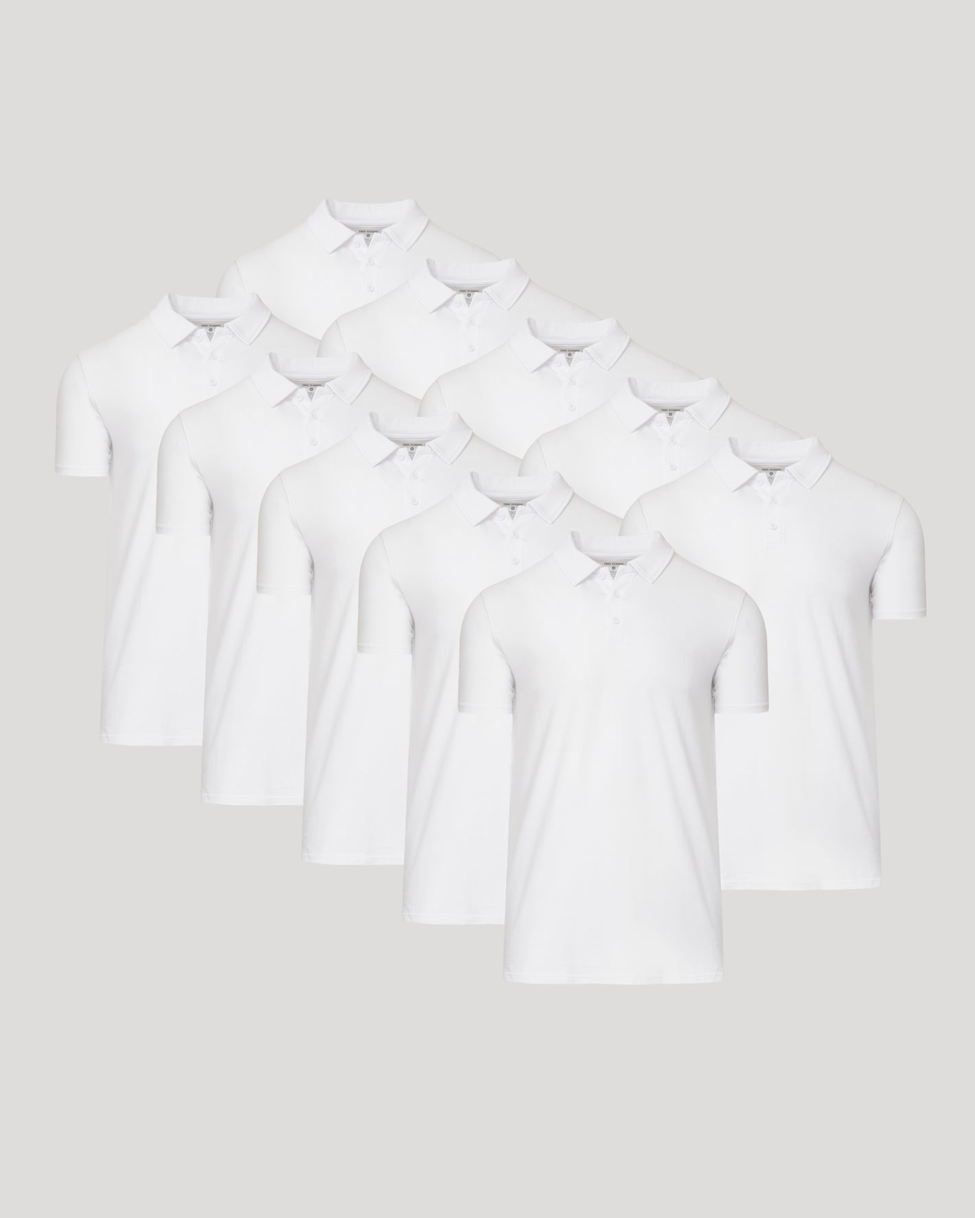All White Tall Classic Polo 10-Pack neatly arranged, highlighting classic collars.
