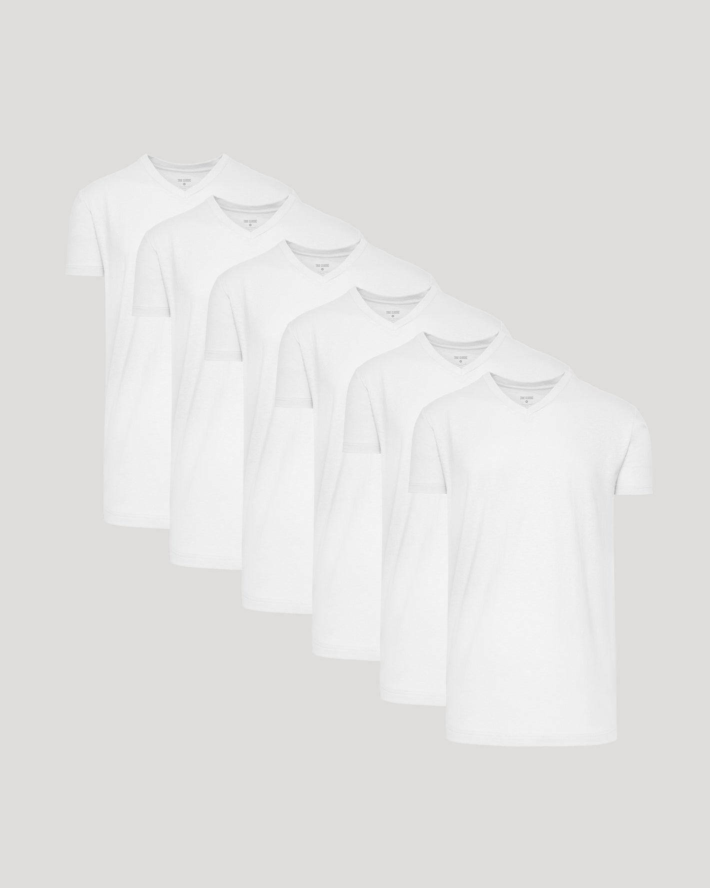 White Short Sleeve Tall Classic V-Neck 6-Pack arranged on display.