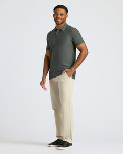 True ClassicMan models True Classic Men’s Classic Short Sleeve Polo Shirt, showcasing its fit.