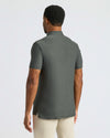 Man wearing True Classic Men’s Classic Short Sleeve Polo Shirt, premium comfort fit.