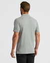 Back view of man in True Classic Men’s Classic Short Sleeve Polo.