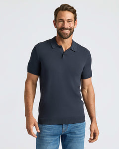 True ClassicMan wearing Navy Dressy Polo and blue jeans, smiling confidently.
