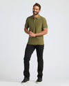 Military Green Active Polo 2.0 worn by smiling man.
