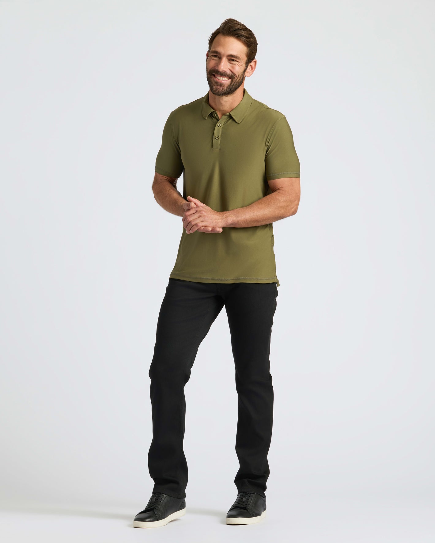 Military Green Active Polo 2.0 worn by smiling man.