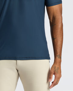 True ClassicNavy Active Polo 2.0 on torso with tattoos.