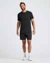 Man wearing Black Active Mesh Crew, showcasing athletic fit and mesh fabric.